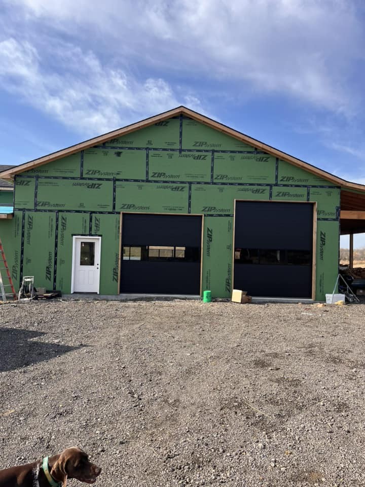 Black commercial shop garage doors installation
